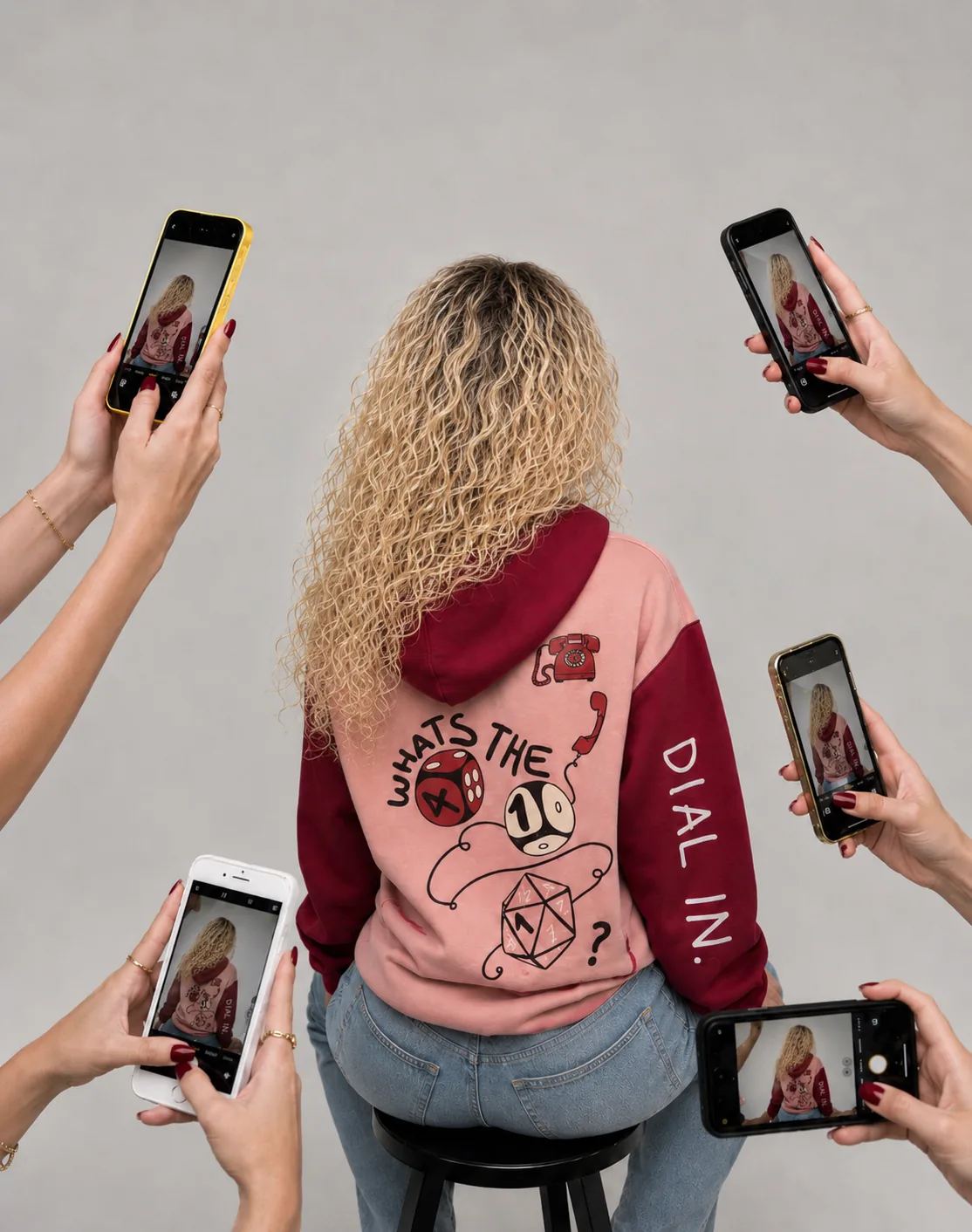The 411 hoodie content shoot with phones
